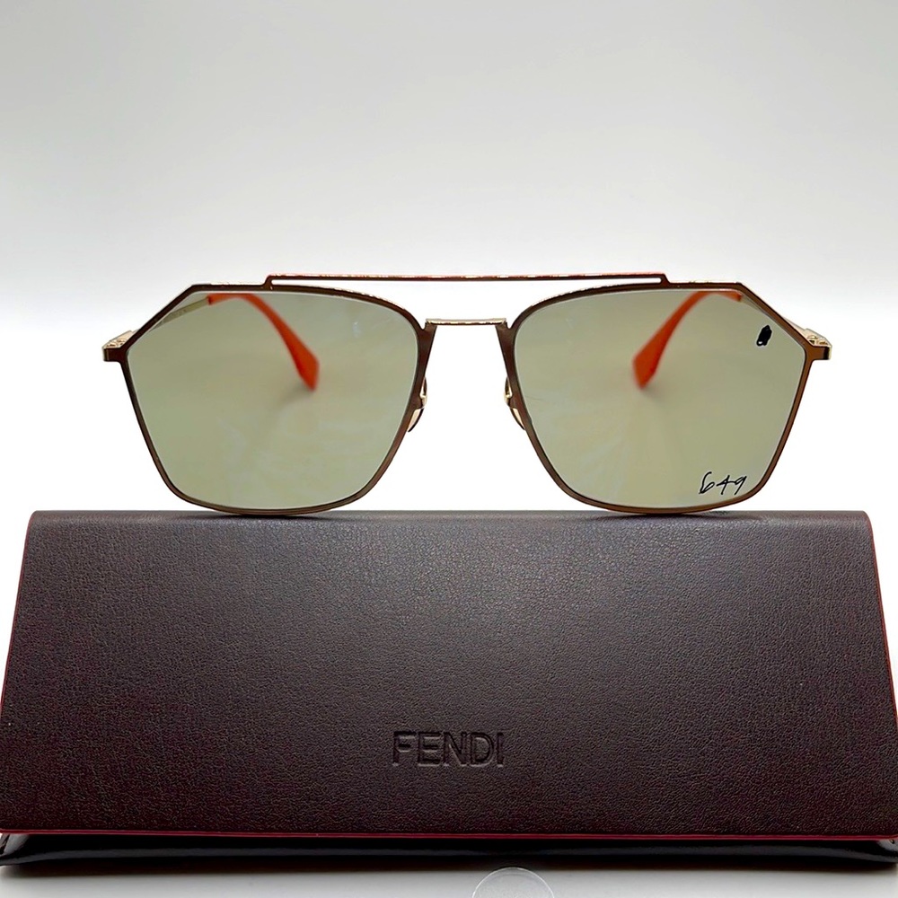 NWOT! Fendi unisex sunglasses. Gold wire frames with orange tips and bridge bar.